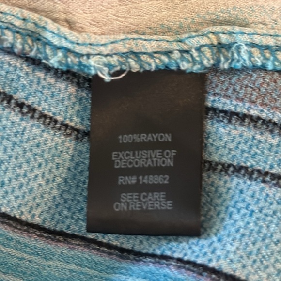 Torrid Babydoll Crinkle Gauze Crochet Inset Lace Up Top - Picture 8 of 8